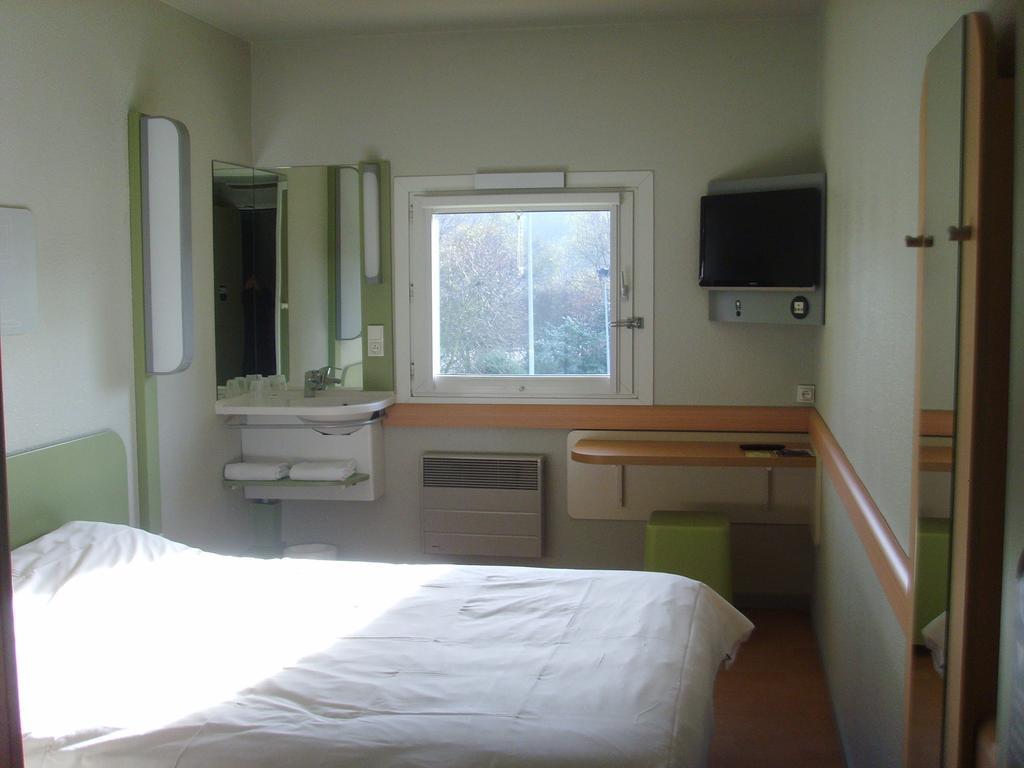 Ibis Budget L'Isle Adam Zimmer foto